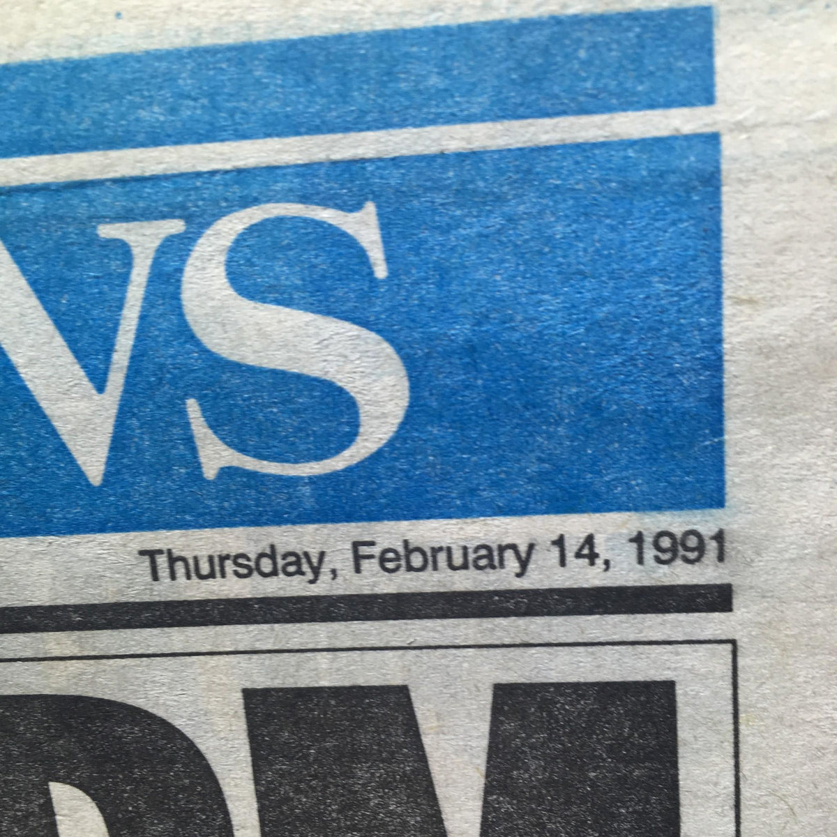 Close-up of the date on the New York Daily News, confirming it was published on Thursday, February 14, 1991.
