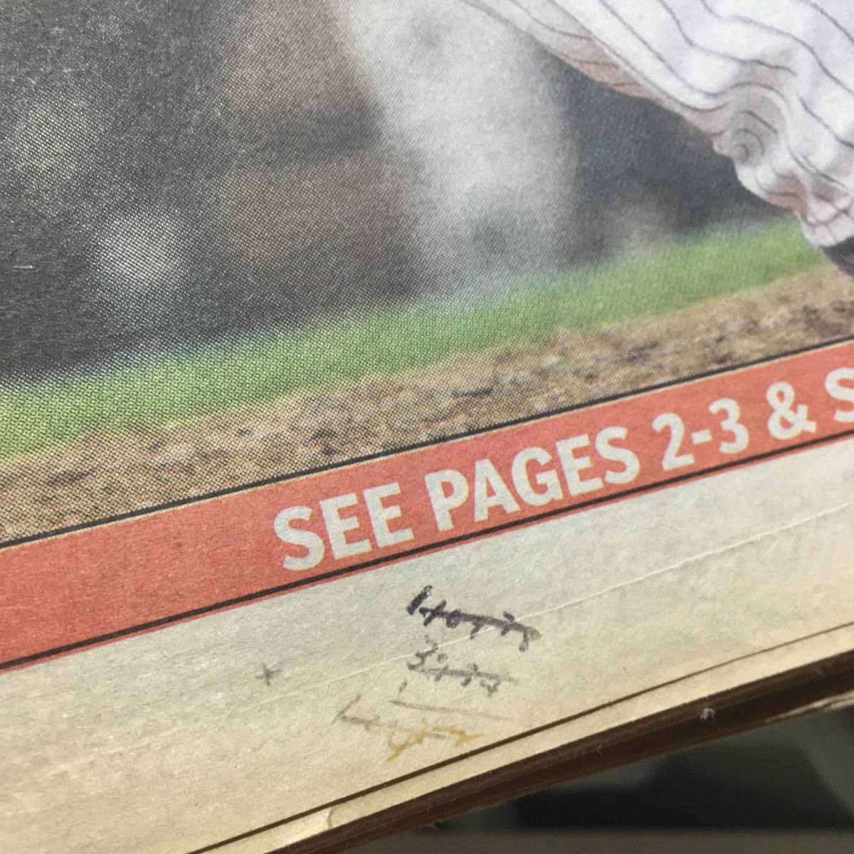 Detail showing the caption 'SEE PAGES 2-3 & 4' on the October 30, 2009, NY Daily News edition titled 'Blast Off Yanks Power Past Phils, Tie Series' with minor handwritten notes.