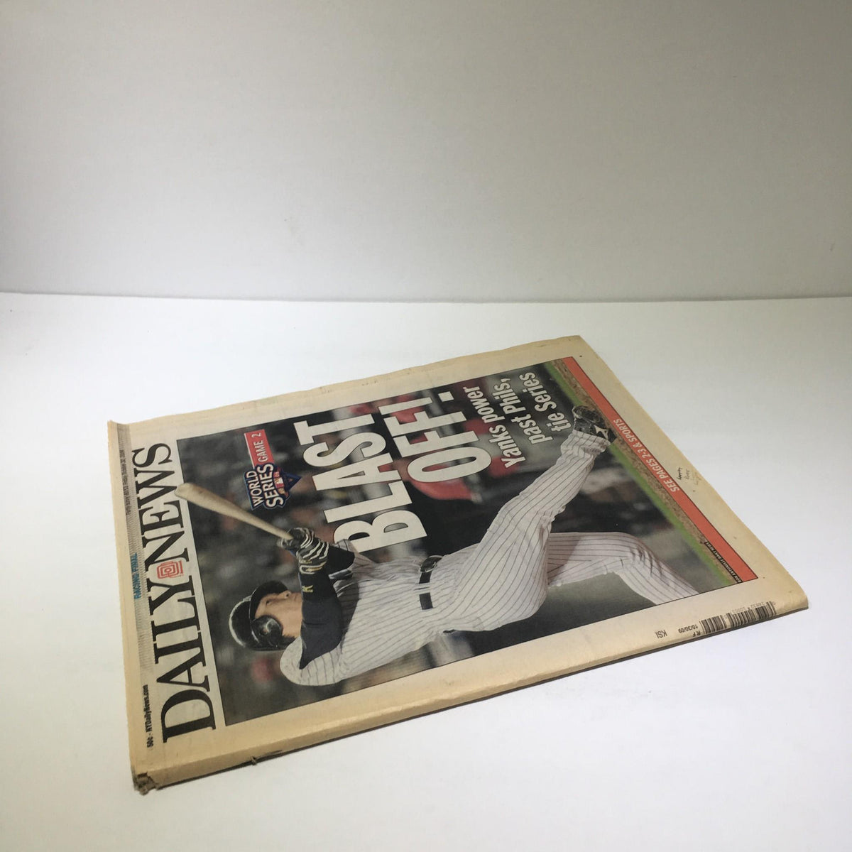 Front cover of the October 30, 2009, NY Daily News featuring the title 'Blast Off!' highlighting the New York Yankees victory, with the player in action.