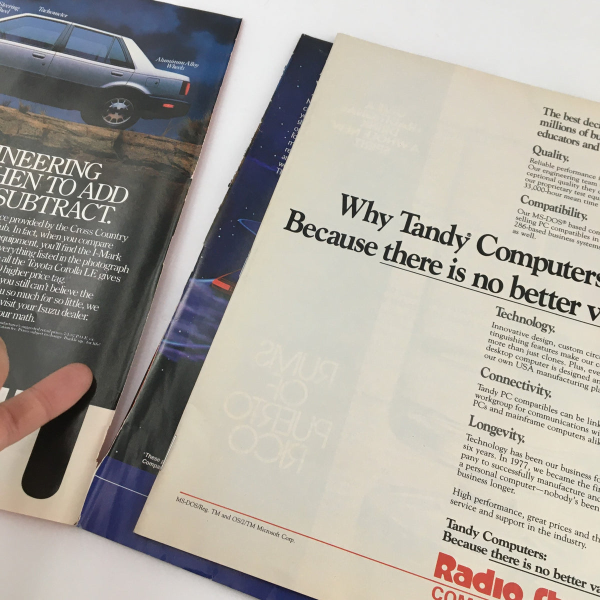 Interior pages from Time Magazine dated August 17, 1987, showcasing advertisements from the era, including tech promotions and vehicle marketing.