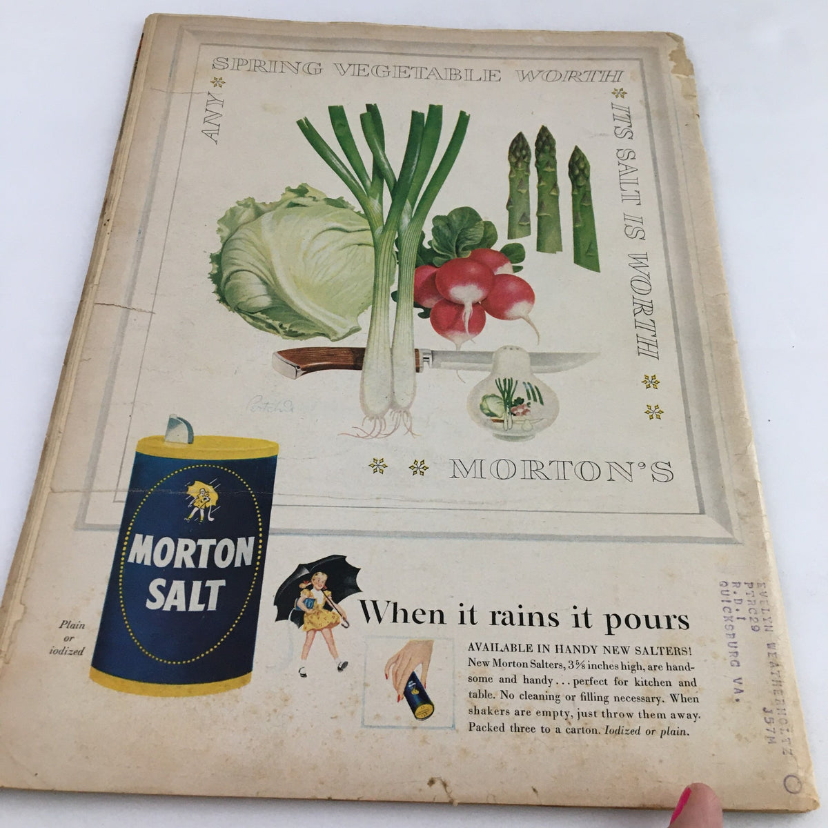 Back cover of Town Journal Magazine May 1955 featuring a vintage advertisement for Morton Salt with illustrations of fresh vegetables and a playful character.