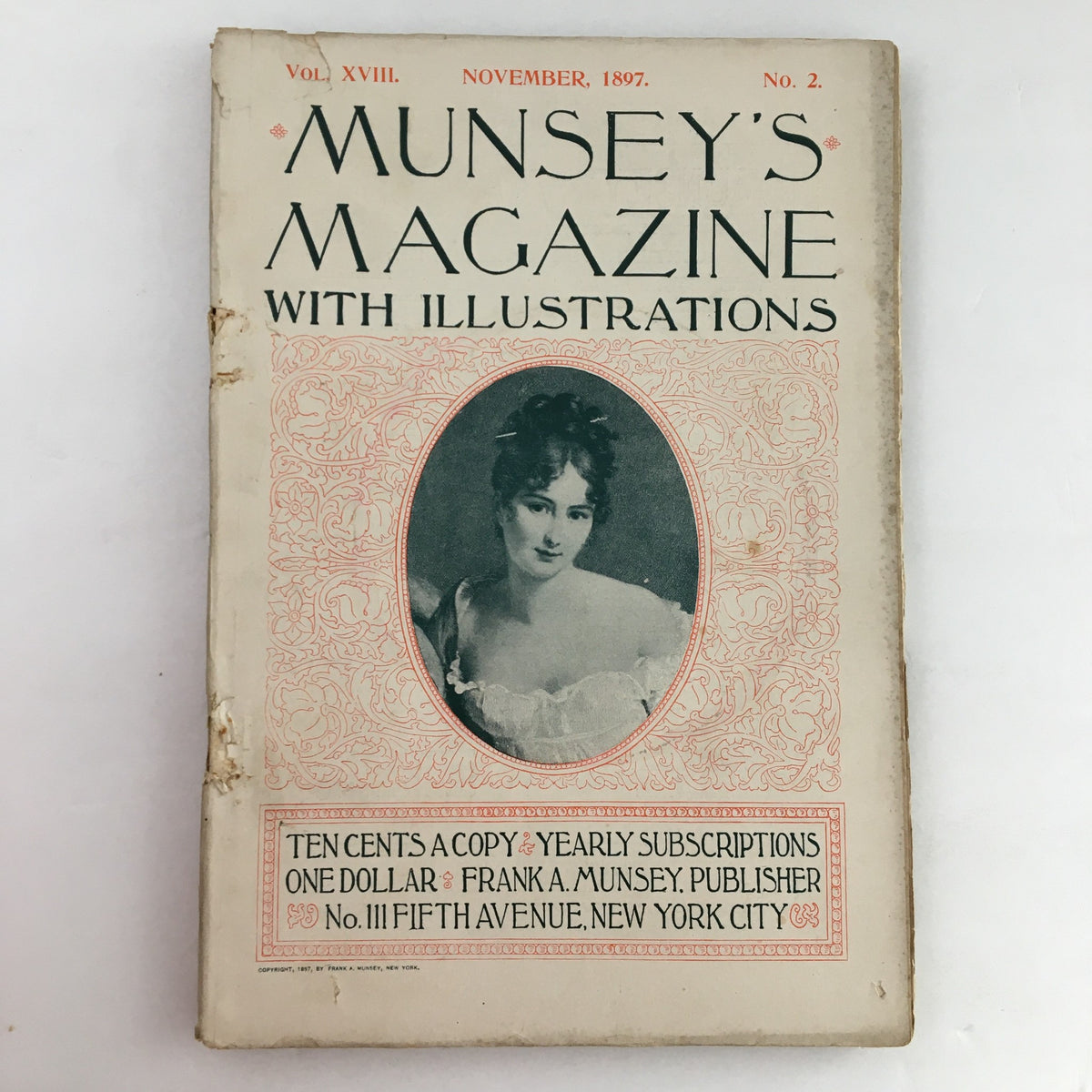 Cover of Munsey's Magazine November 1897, Vol. 18 No. 2 featuring a portrait of a woman, showcasing its decorative elements and title in bold lettering.