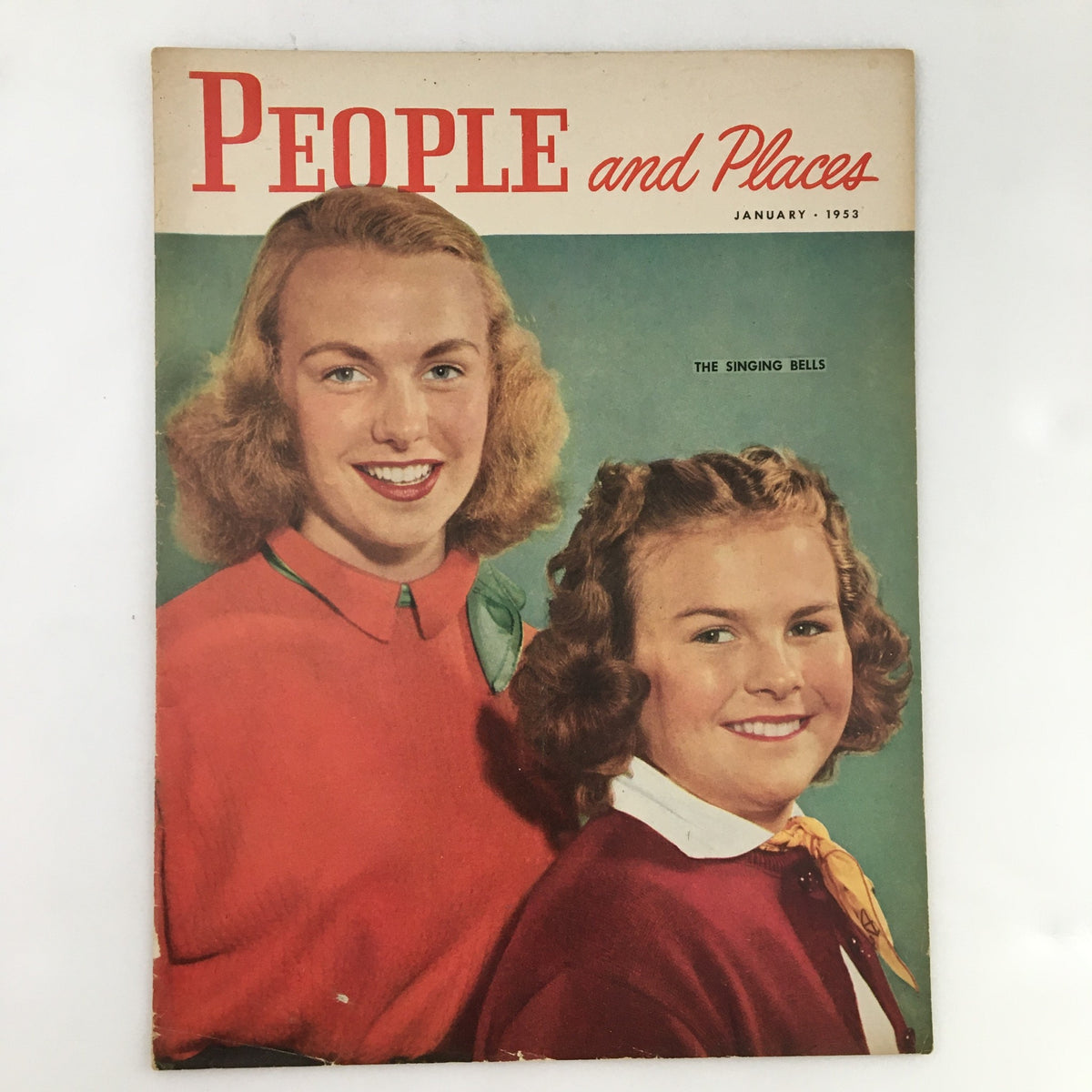 Cover of People and Places Magazine, January 1953, featuring 'The Singing Bells' with two smiling girls in vintage clothing.