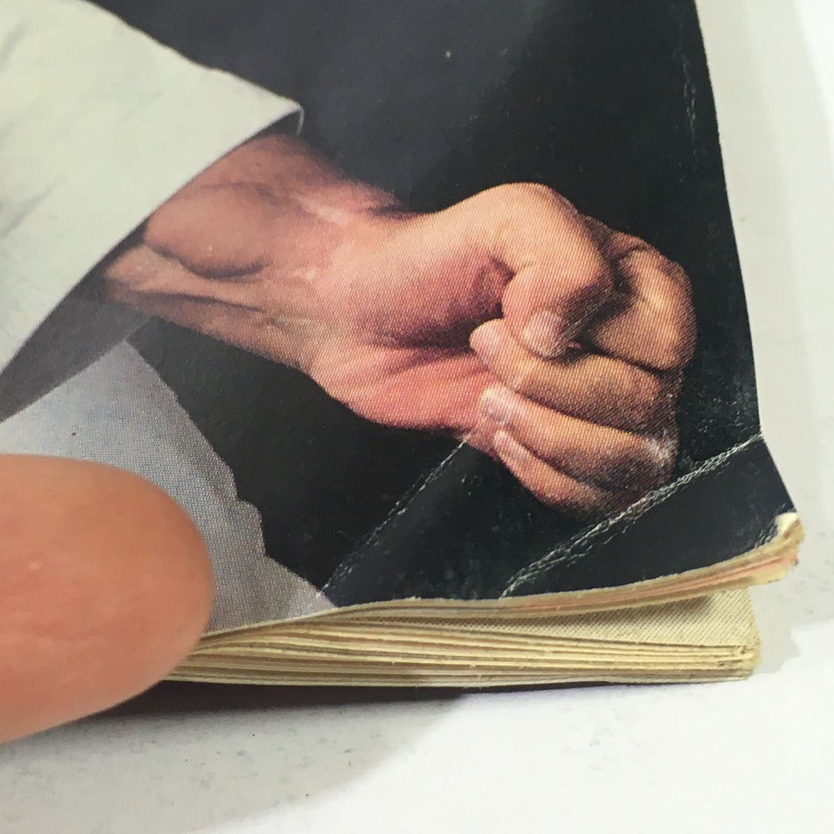 Close-up image of a fist featured in Inside Karate Magazine February 1990, showcasing martial arts technique details and the condition of this vintage magazine.