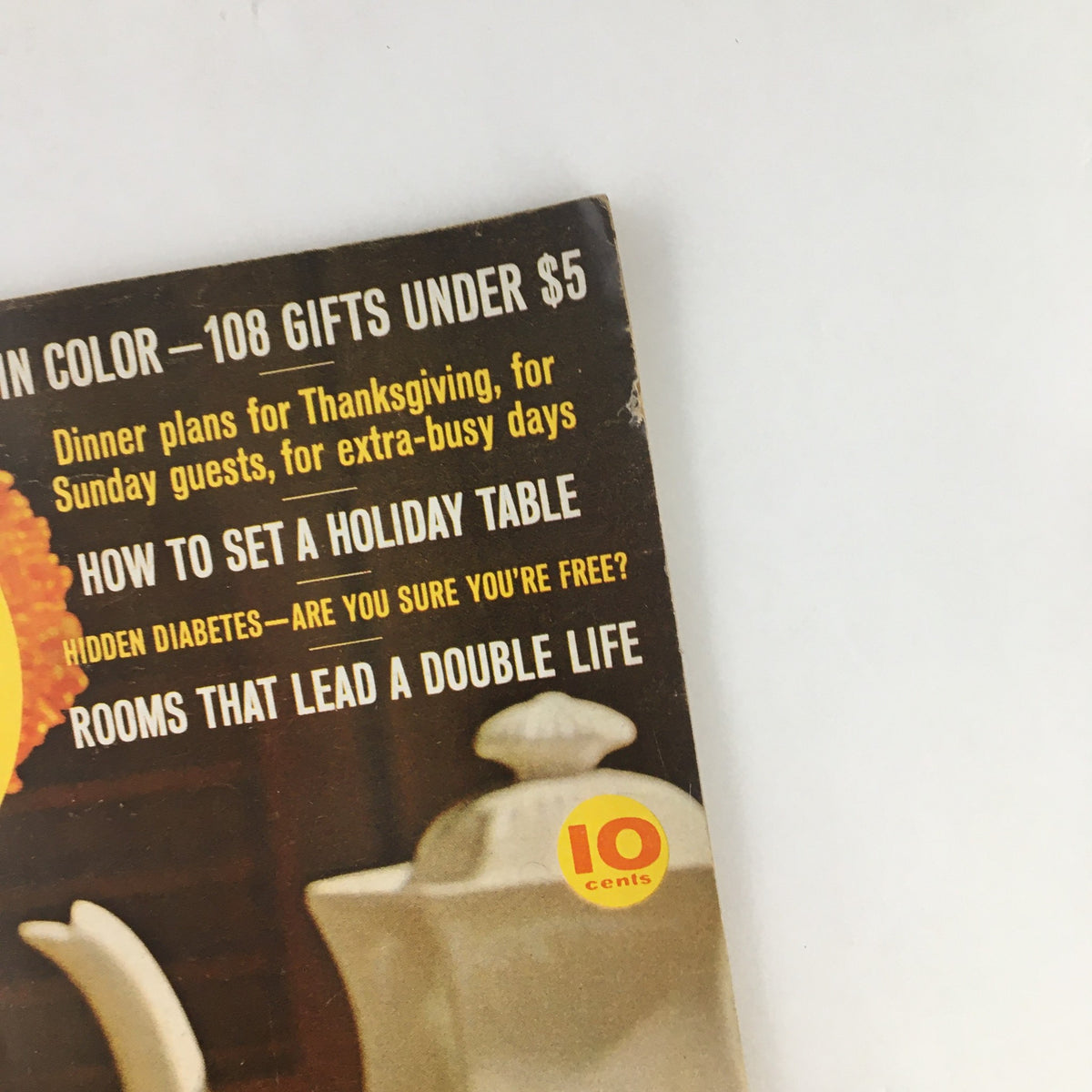 Cover of Family Circle Magazine November 1961 showcasing the title 'How To Set A Holiday Table' with colorful background graphics and vintage design elements.