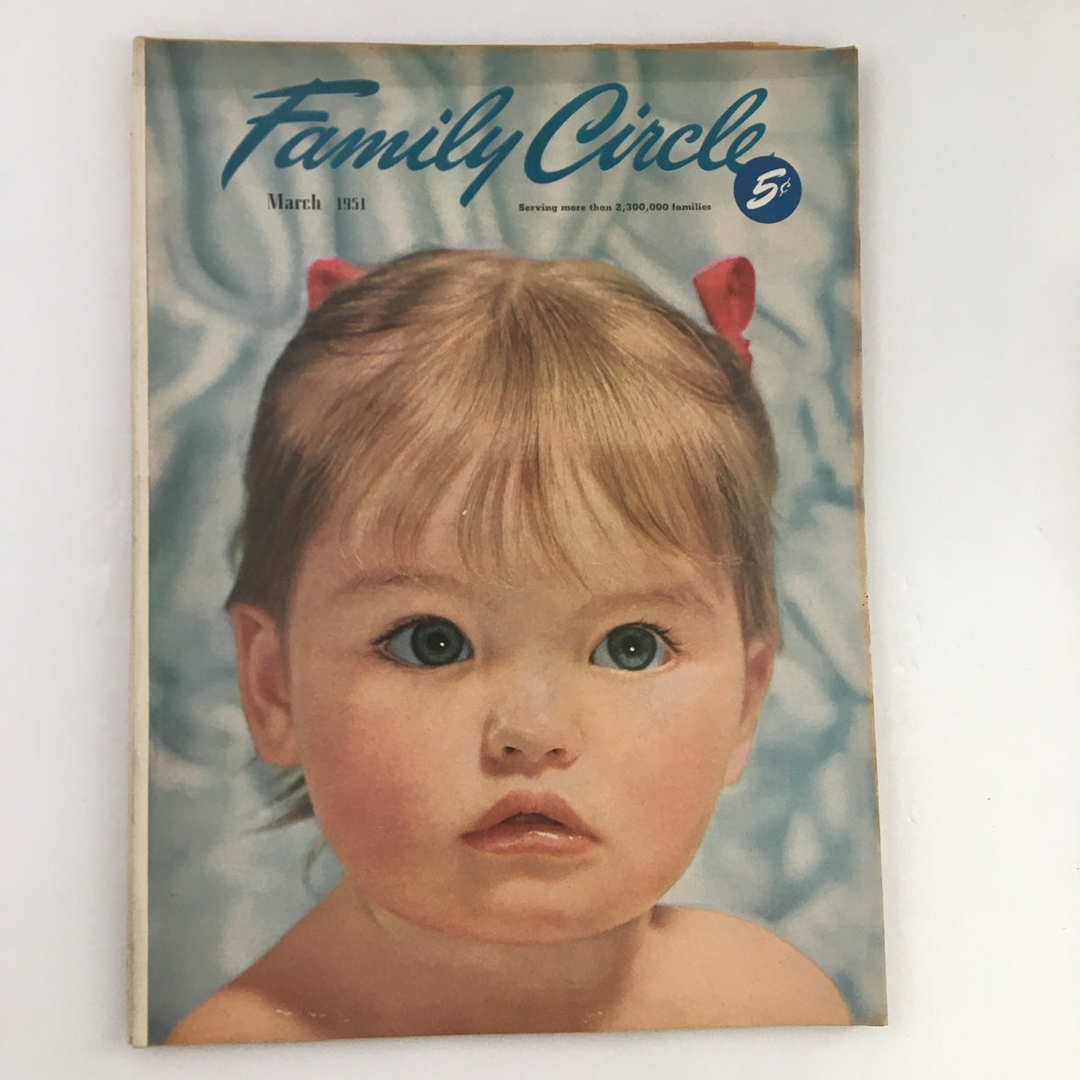 Cover of Family Circle Magazine from March 1951 featuring a child with blue eyes and a cute hairstyle, dedicated to 'Your Child's Health'. Vintage magazine ideal for collectors.