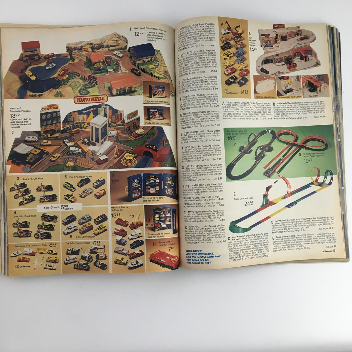 1980 The JCPenney Dandy Christmas A World of Fashion Catalog showcasing Matchbox toys and playsets, including detailed images of various toy vehicles and play areas.