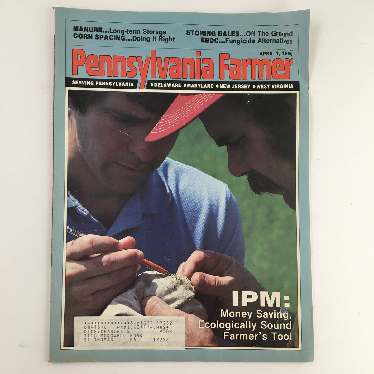 Cover of the Pennsylvania Farmer Magazine, April 1, 1990, featuring an article on scouting for alfalfa leafhopper, showcasing two farmers examining a sample in a field.