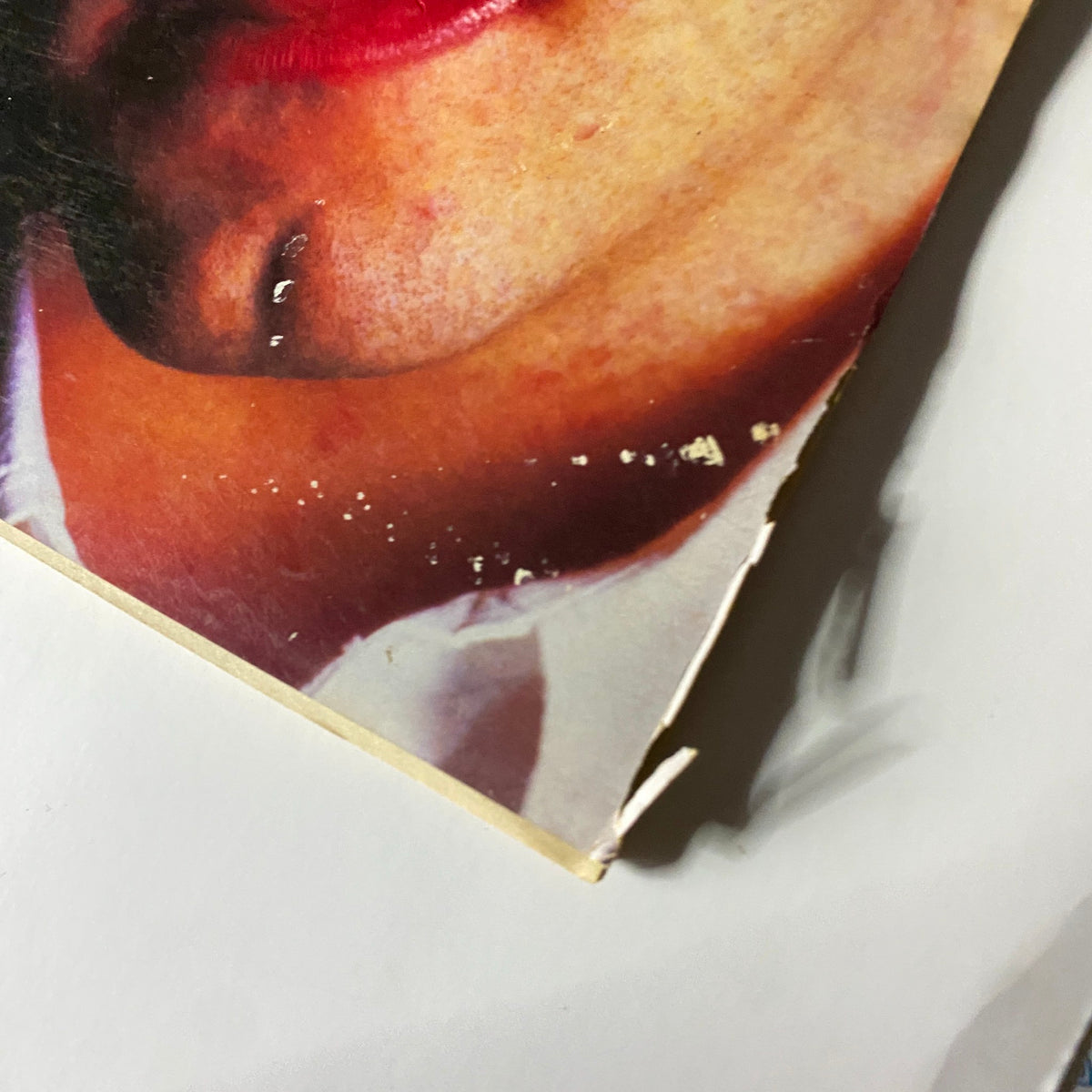 Close-up detail of Robert Smith on the cover of VTG Spin Magazine March 1988, showcasing his iconic style and makeup.