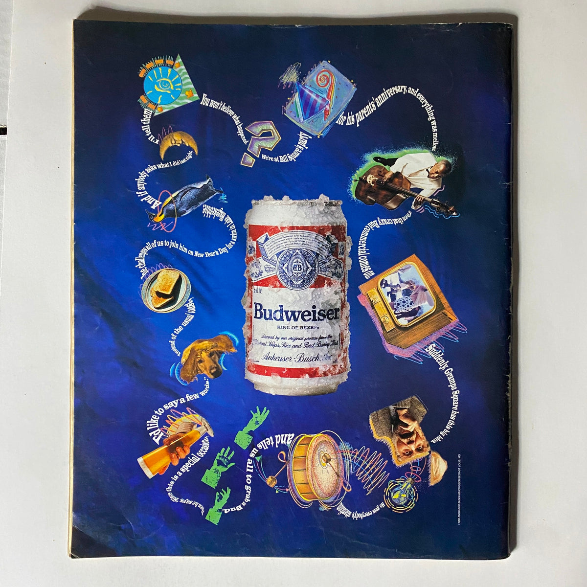 Back cover of Spin Magazine August 1992, Volume 8, Number 5 featuring an advertisement for Budweiser amid colorful graphics.