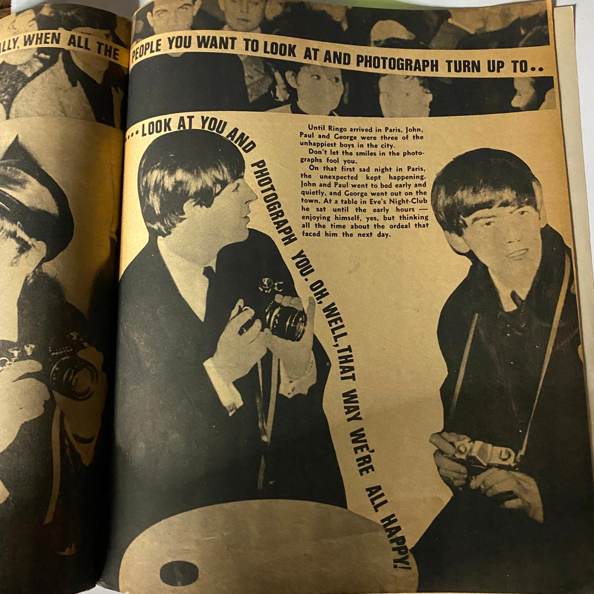 Inside spread of the Vintage 1964 The Beatles Around The World Magazine with photos of Paul and John, discussing their experiences as pop stars in the 1960s.