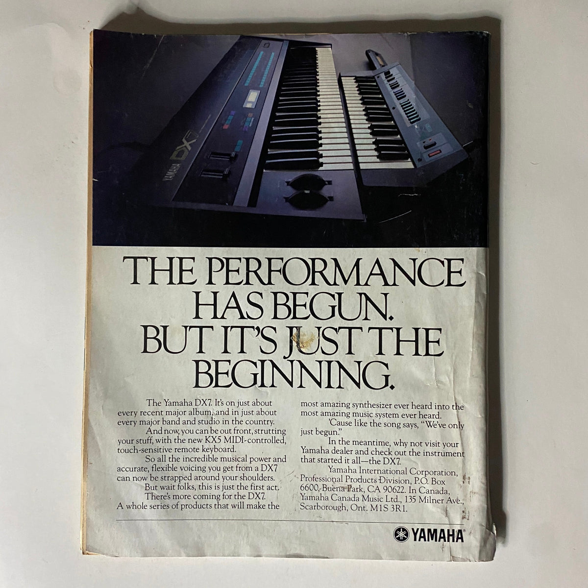 Back cover of VTG Musician Magazine December 1985 displaying an advertisement for the Yamaha DX7 synthesizer, promoting its performance capabilities.