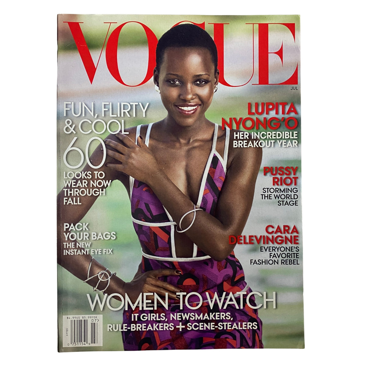 Cover of Vogue Magazine July 2014 featuring actress Lupita Nyong'o, highlighting her amazing breakout year with the tagline 'Women to Watch'. The magazine showcases vibrant fashion and cultural stories.