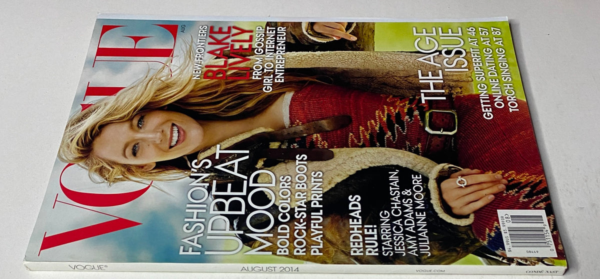 Vogue Magazine August 2014 featuring Blake Lively on the cover, emphasizing fashion trends and lifestyle insights in a chic presentation.
