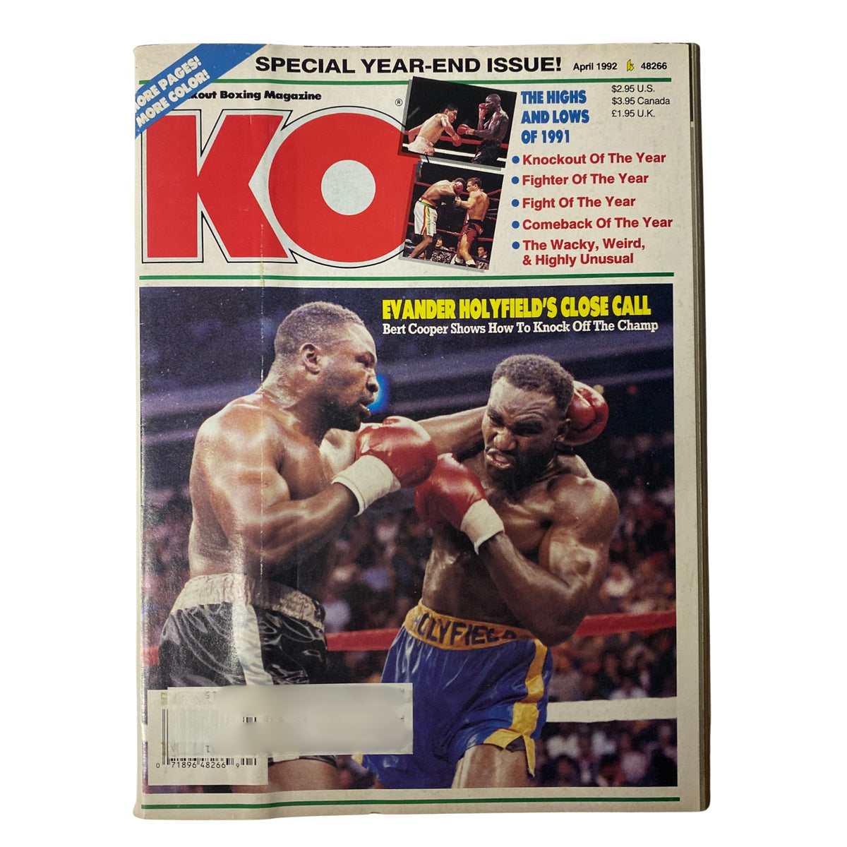 KO Boxing Magazine April 1992 featuring a dramatic cover photo of Evander Holyfield and Bert Cooper in the ring, showcasing the intense heavyweight match.