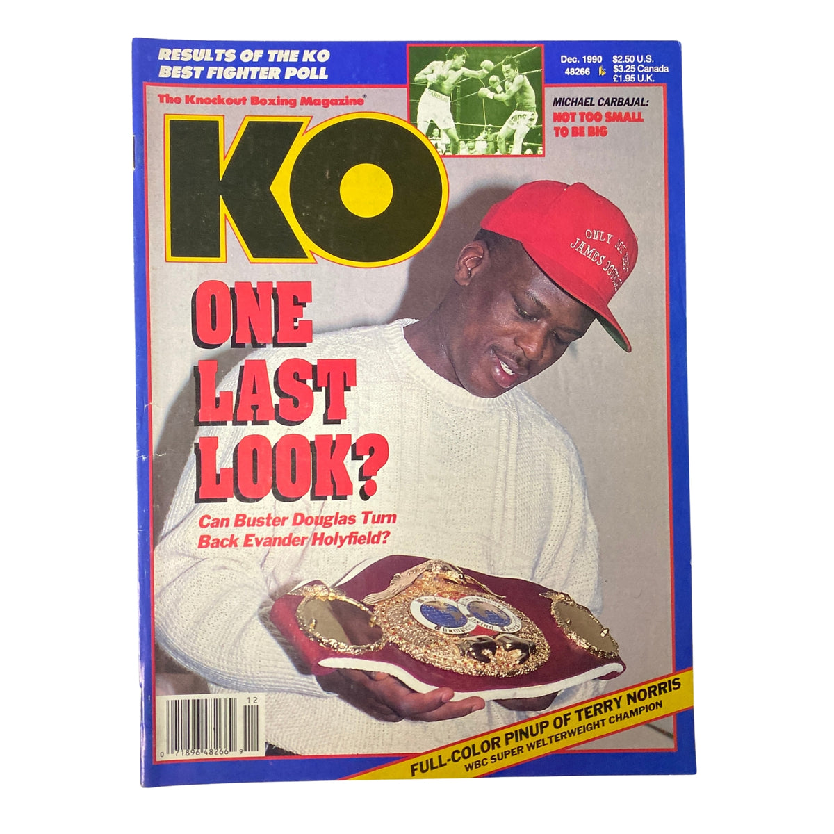 KO Boxing Magazine December 1990 featuring Buster Douglas on the cover, showcasing his title fight against Evander Holyfield with bold headlines and vibrant colors.