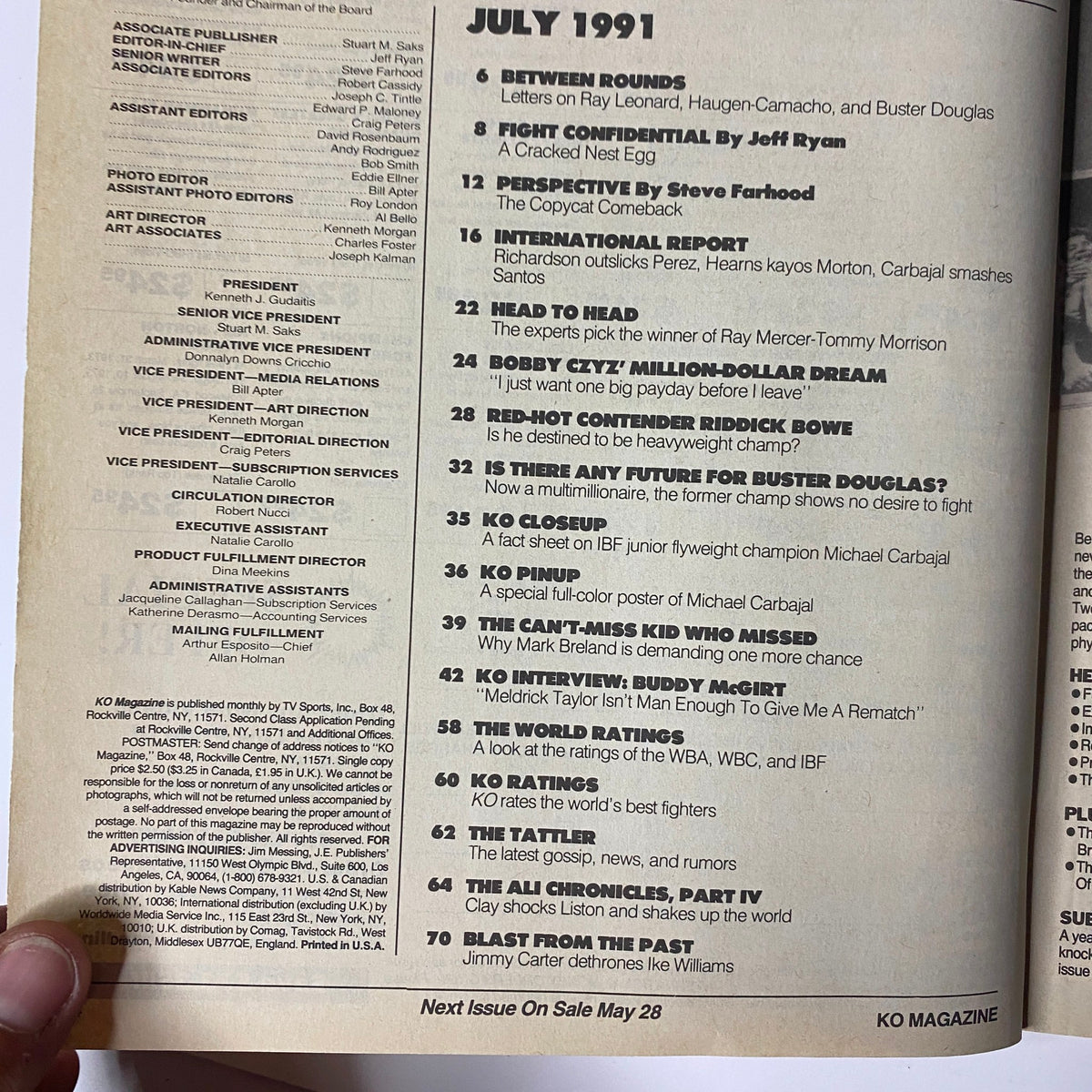 Table of contents from KO Boxing Magazine July 1991, listing features including Riddick Bowe, Tyrell Biggs, and articles on notable boxing events and figures.