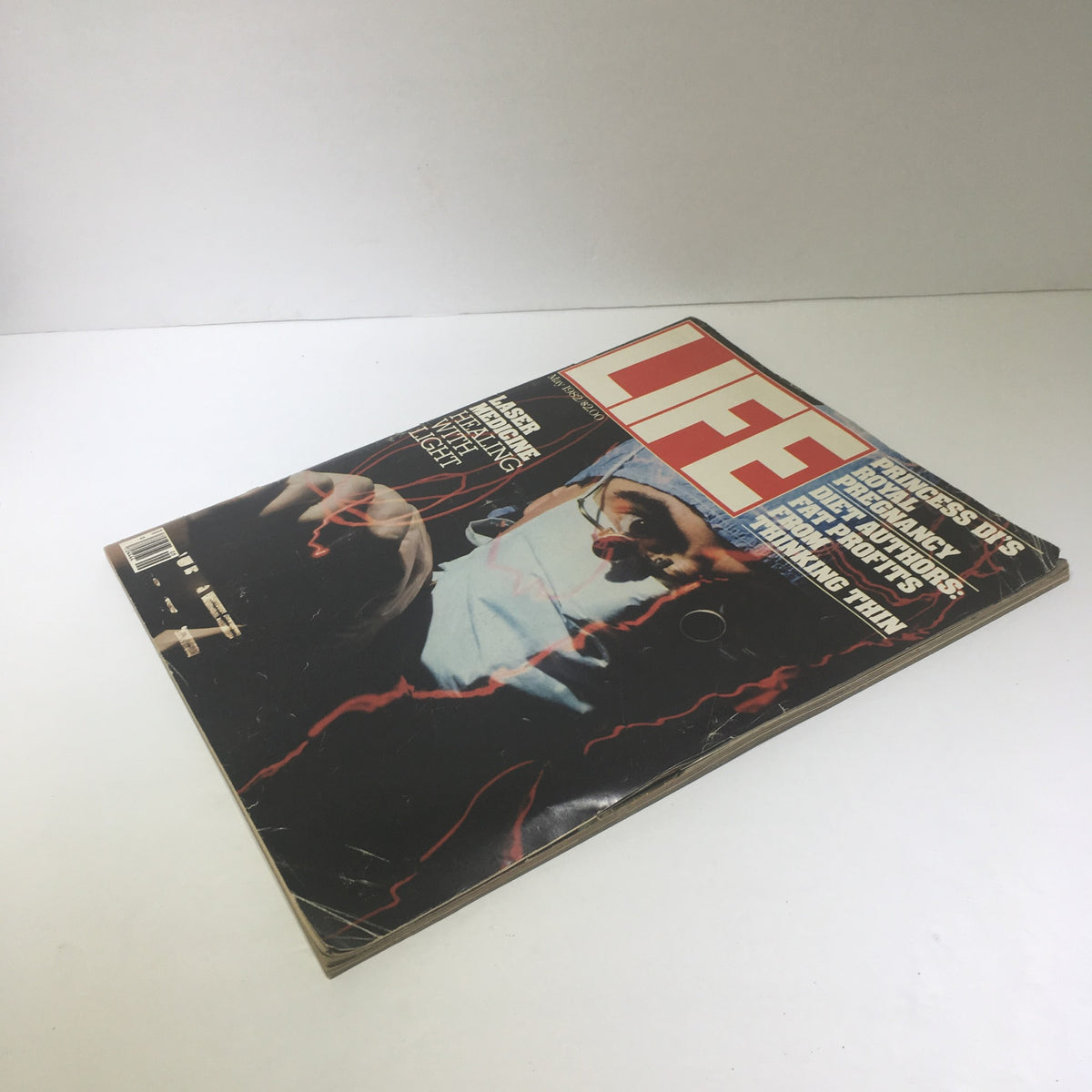 Life Magazine featuring 'Laser Medicine - Princess Di's Royal Pregnancy' from May 1982, showcasing a striking cover design. This vintage magazine highlights Princess Diana and the advancements in laser medicine, perfect for collectors and royal enthusiasts.