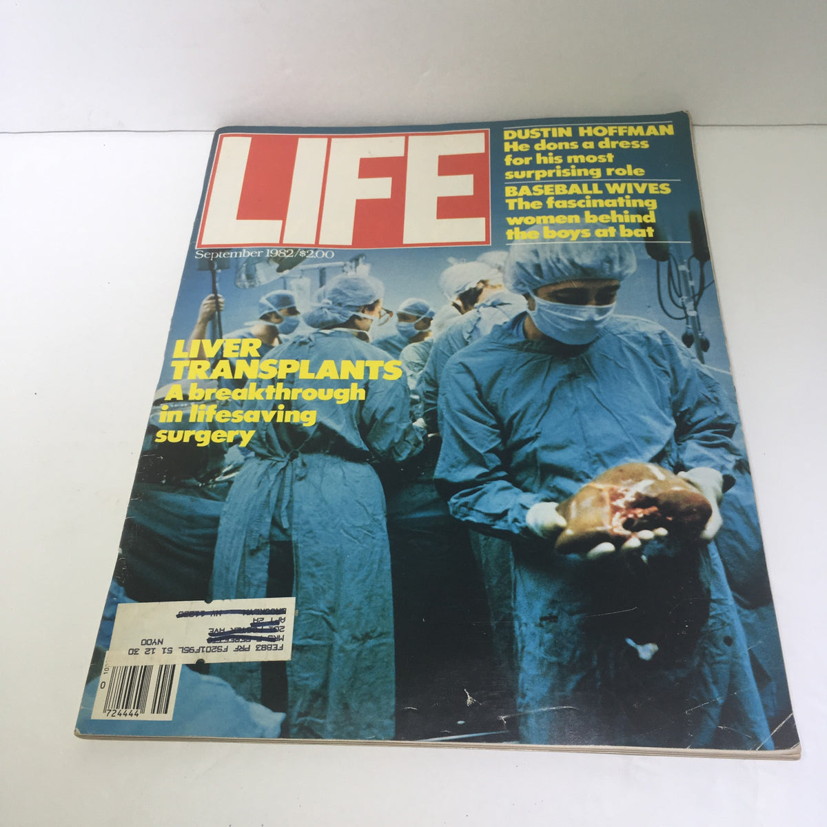 September 1982 issue of Life Magazine featuring a cover on liver transplants, showcasing medical professionals in surgical attire with the headline 'LIVER TRANSPLANTS: A breakthrough in lifesaving surgery'. The cover also mentions Dustin Hoffman and other featured articles.