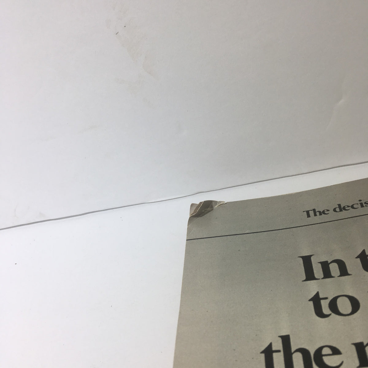 Top corner of a page in Life Magazine: Liver Transplants - Dustin Hoffman - September 1982, showing a slightly torn corner with a plain background.