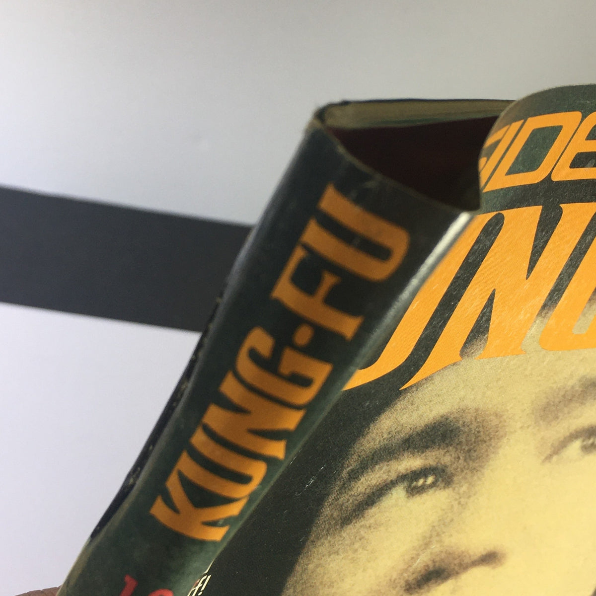 Spine view of Inside Kung Fu Magazine January 1993, showing the title prominently; a vintage magazine featuring Bruce Lee and Jean-Claude Van Damme, reflecting its collectible status.