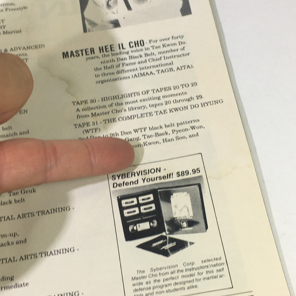Black Belt Yearbook March 1991, showcasing Master Hee Il Cho's instructional tapes and promotional material for self-defense.