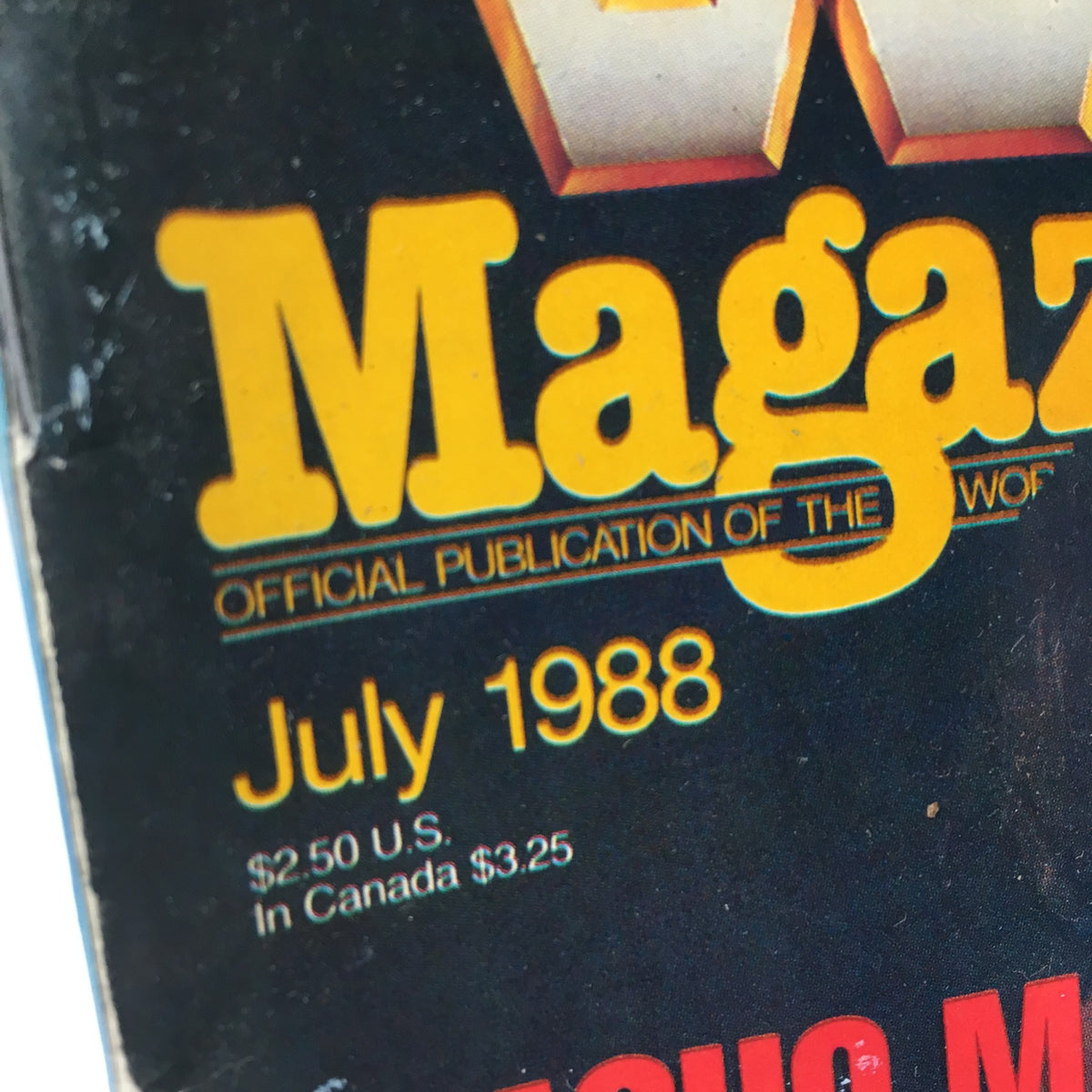 Cover detail of WWF Magazine: Macho Man - Undisputed WWF Champion July 1988 featuring bold text and publication date.
