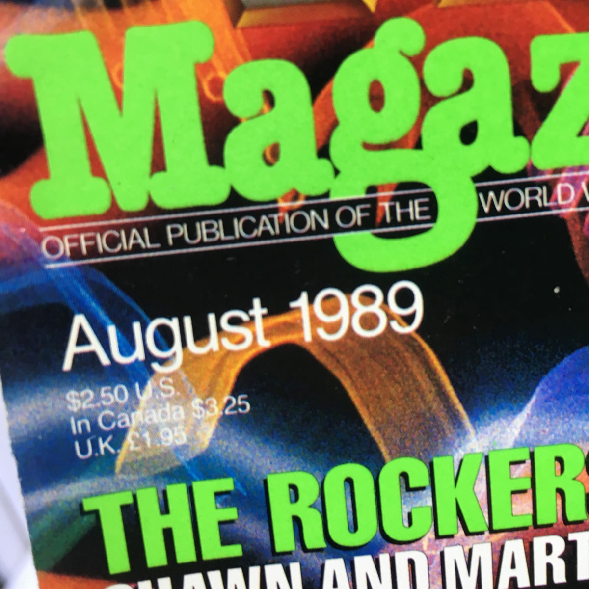 Close-up of WWF Magazine: The Rockers - Summerslam is Coming! August 1989 showing the magazine title and publication date.