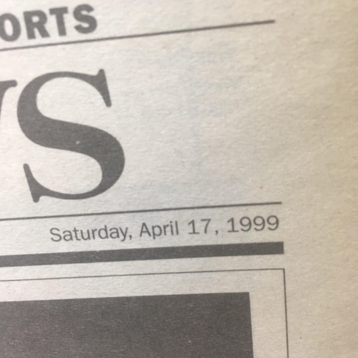 Detailed view of the publication date 'Saturday, April 17, 1999' on the NY Daily News newspaper.