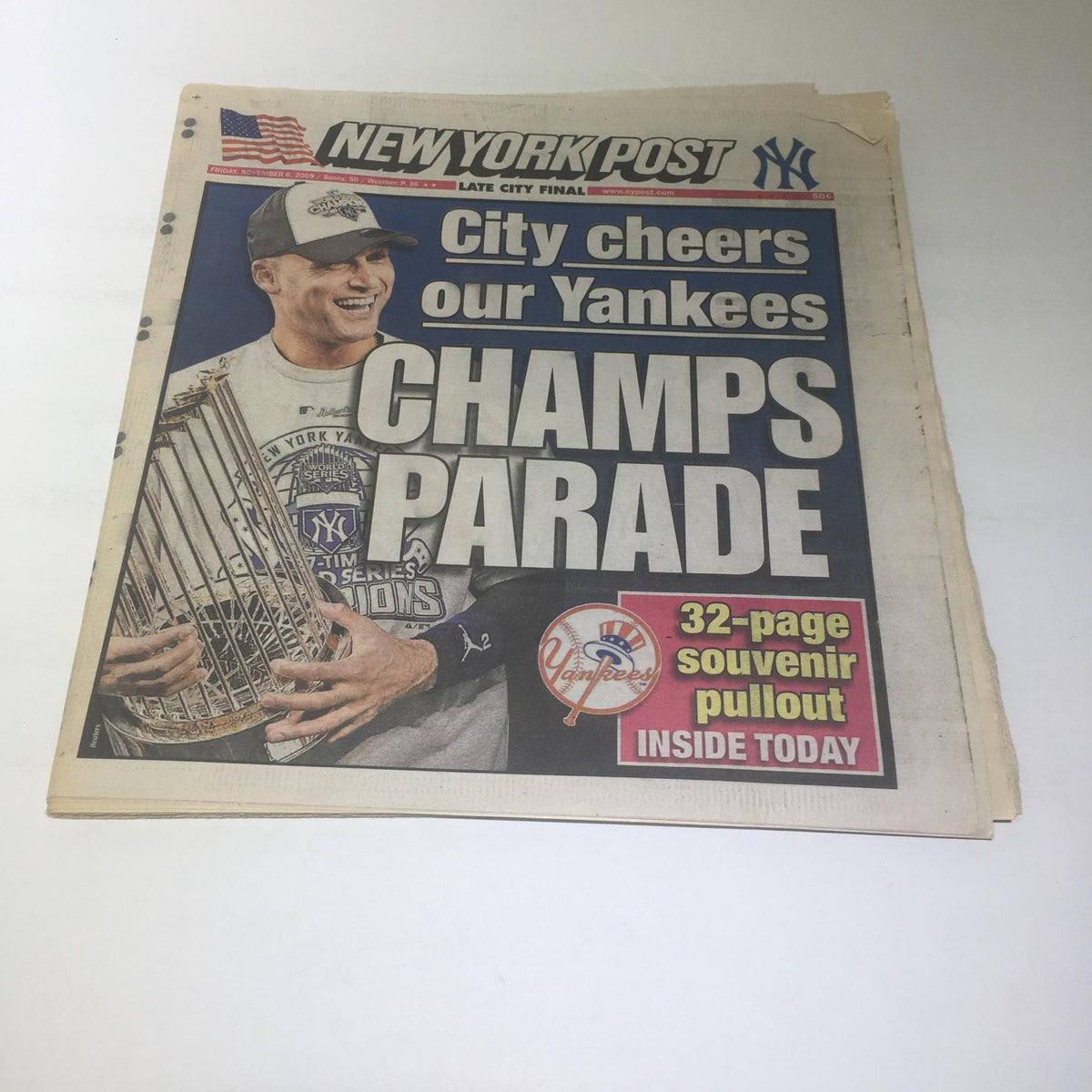 NY Post: Nov 6 2009, City Cheers our Yankees Champs Parade - front page featuring a celebratory image of a Yankees player holding the championship trophy.