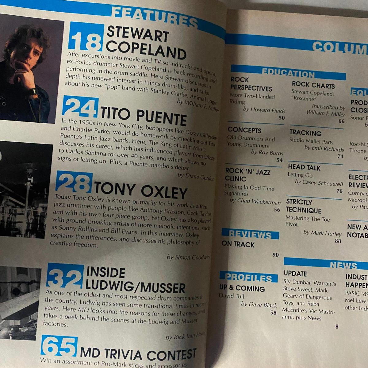 Inside page of Modern Drummer Magazine April 1990 displaying features on Stewart Copeland, Tito Puente, and Tony Oxley along with content sections listing articles and drum techniques.