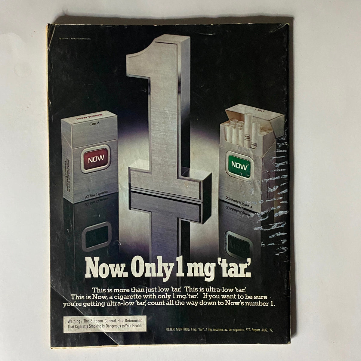 Back cover of VTG New Dawn for Women Magazine March 1978 advertising a cigarette brand, emphasizing health warnings related to smoking.