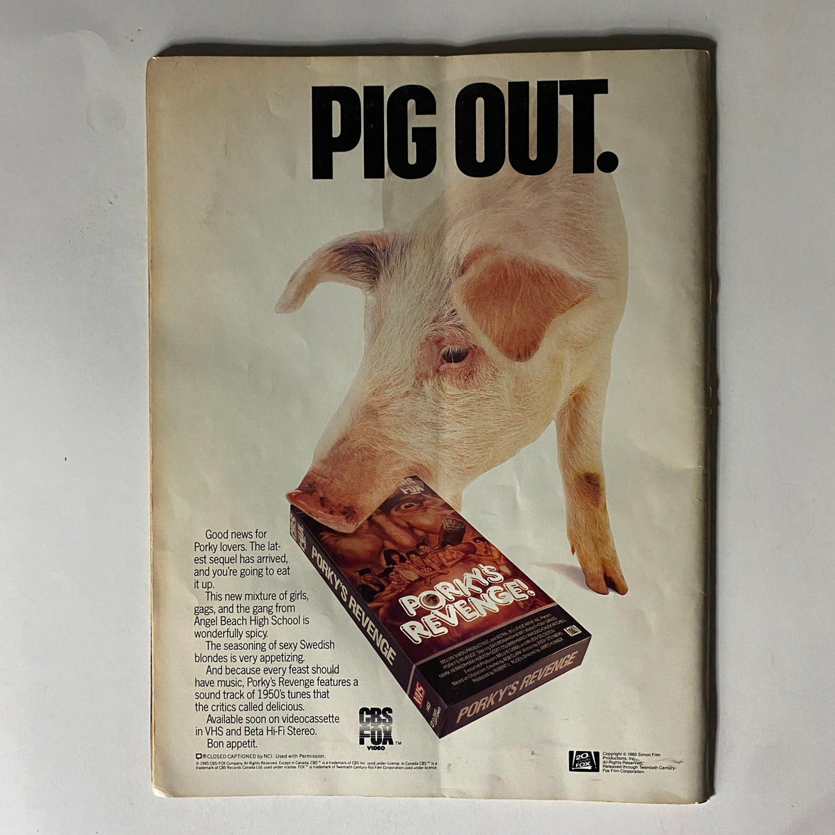 Vintage advertisement featuring a pig and promoting the movie 'Porky's Revenge!' from the September 1985 issue of Record Magazine with Sting on the cover.
