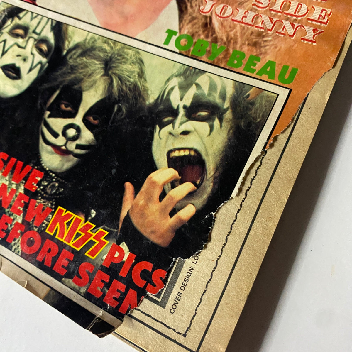 Close-up of the VTG Hard Rock Magazine January 1979 cover highlighting KISS members, emphasizing their unique makeup and energetic expressions.