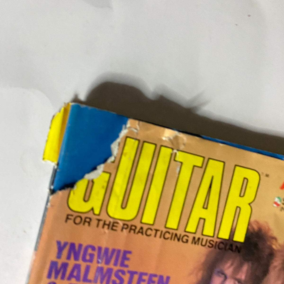 Top corner detail of Guitar Magazine March 1986, highlighting the iconic title and some wear on the cover.