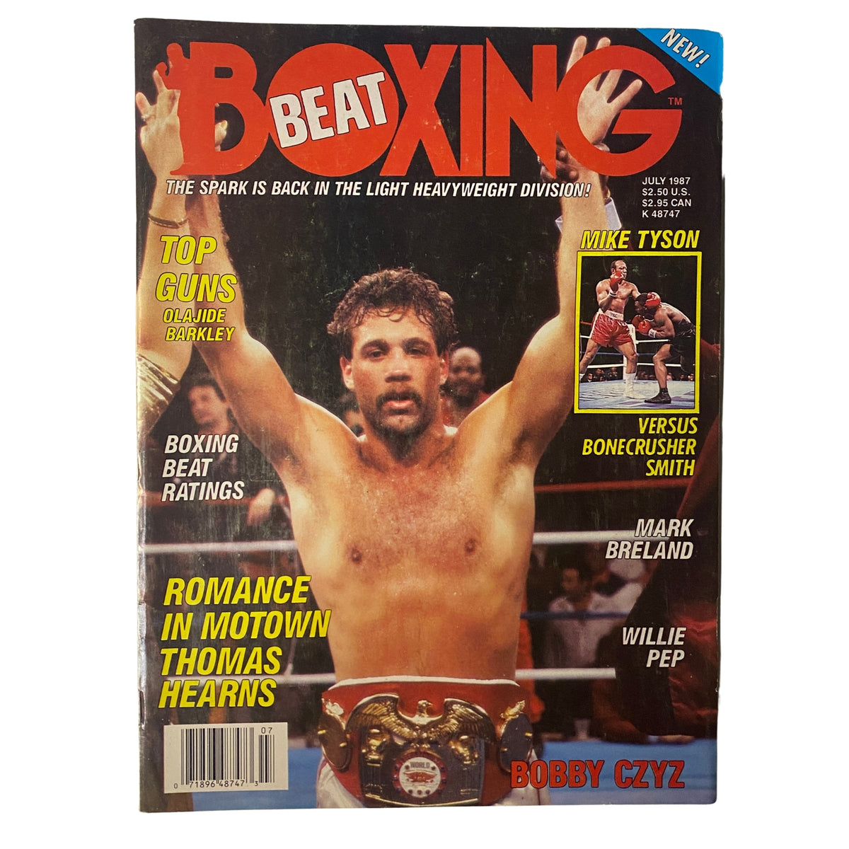 Boxing Beat Magazine July 1987 featuring Bobby Czyz on the cover, showcasing highlights like Mike Tyson, matched against Bonecrusher Smith, and profiles of Thomas Hearns and Mark Breland.