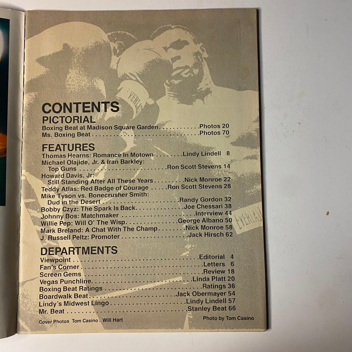 Contents page of Boxing Beat Magazine July 1987, detailing features on Thomas Hearns, Michael Olajide Jr., and Bobby Czyz, along with various departments and pictorials.