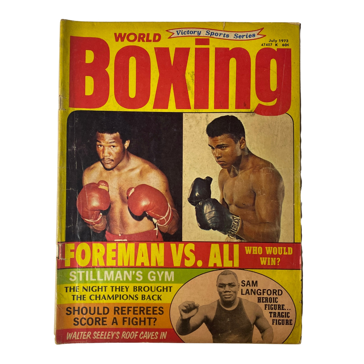Cover of World Boxing Magazine, July 1973, featuring Muhammad Ali and George Foreman with the headline 'Foreman vs. Ali - Who Would Win?'. Includes nostalgic references to boxing legends and significant articles on historical bouts.