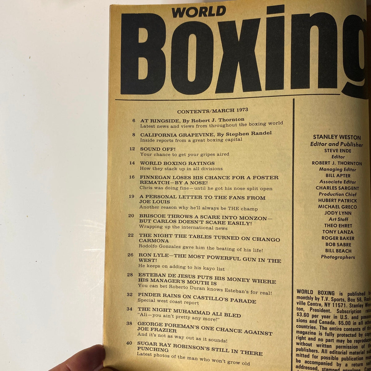 World Boxing Magazine March 1973 showcasing contents including articles by Robert J. Thornton and Stephen Randel, highlighting significant boxing events and figures such as Muhammad Ali and George Foreman, emphasizing the publication's focus on the boxing world.