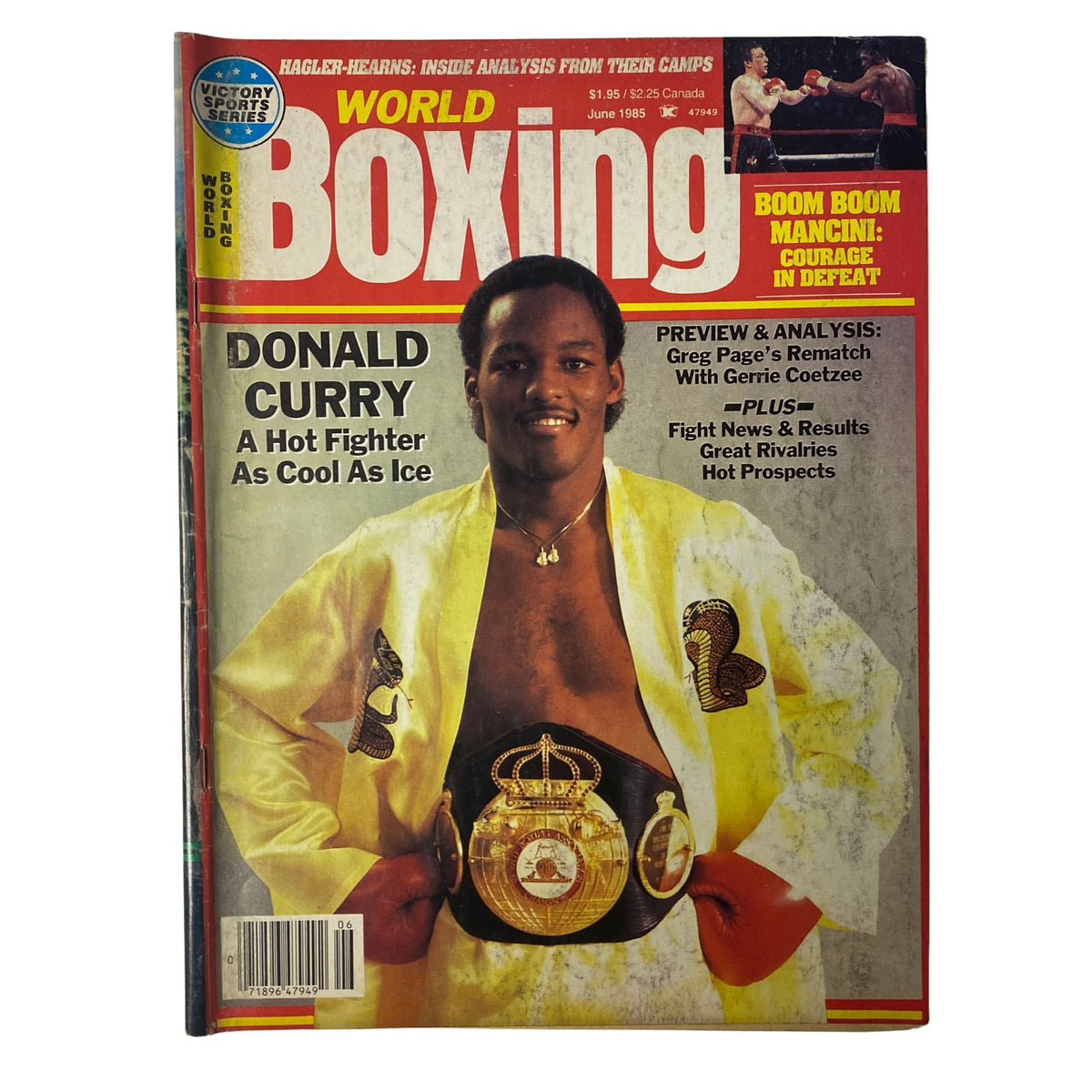 World Boxing Magazine June 1985 featuring Donald Curry on the cover, showcasing him in a stylish pose with championship belts, emphasizing his status as a top fighter.