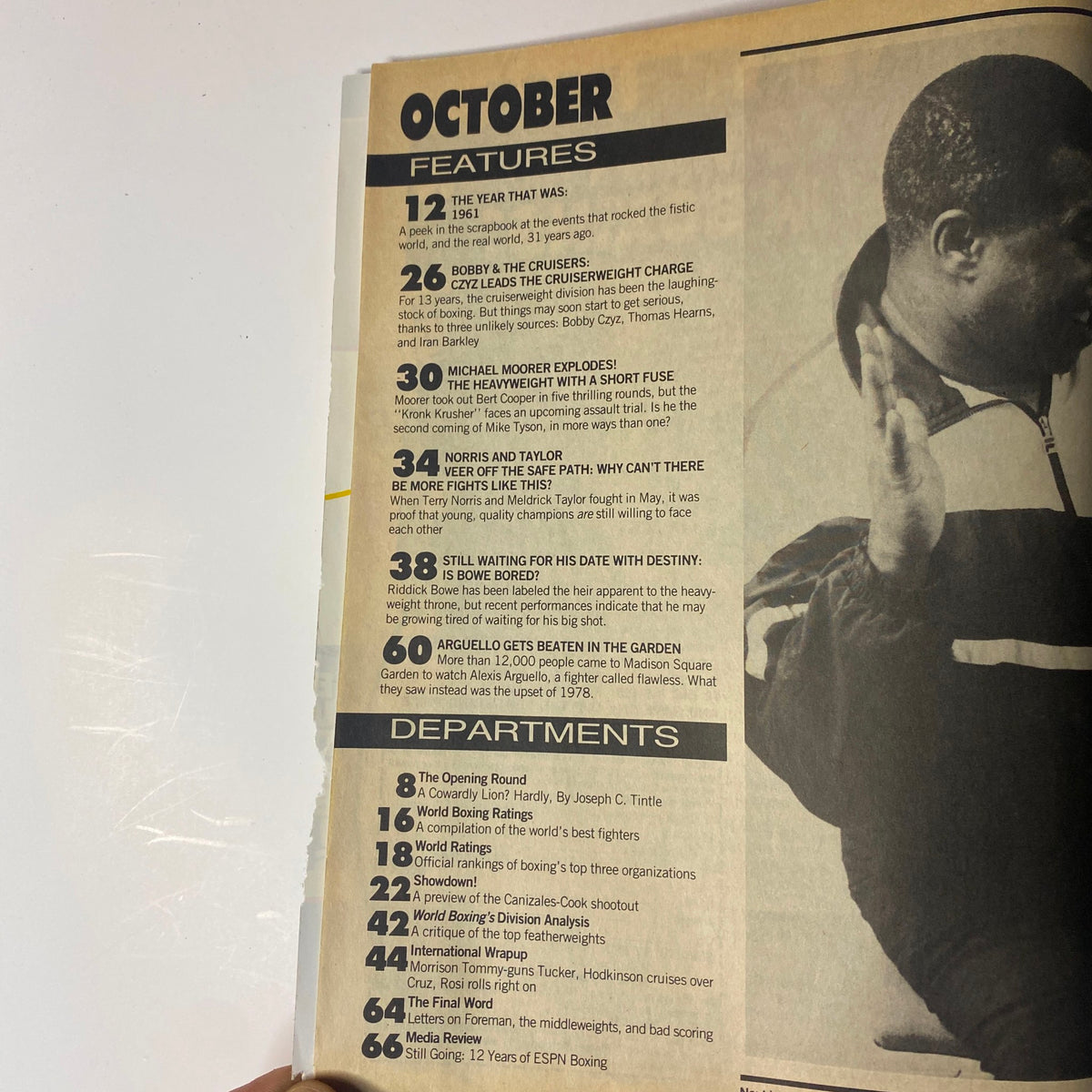 Contents page of World Boxing Magazine, October 1992, listing features such as 'The Year That Was: 1961', 'Michael Moorer Explodes!', and 'Still Waiting for His Date with Destiny: Is Bowe Bored?' along with departmental sections.