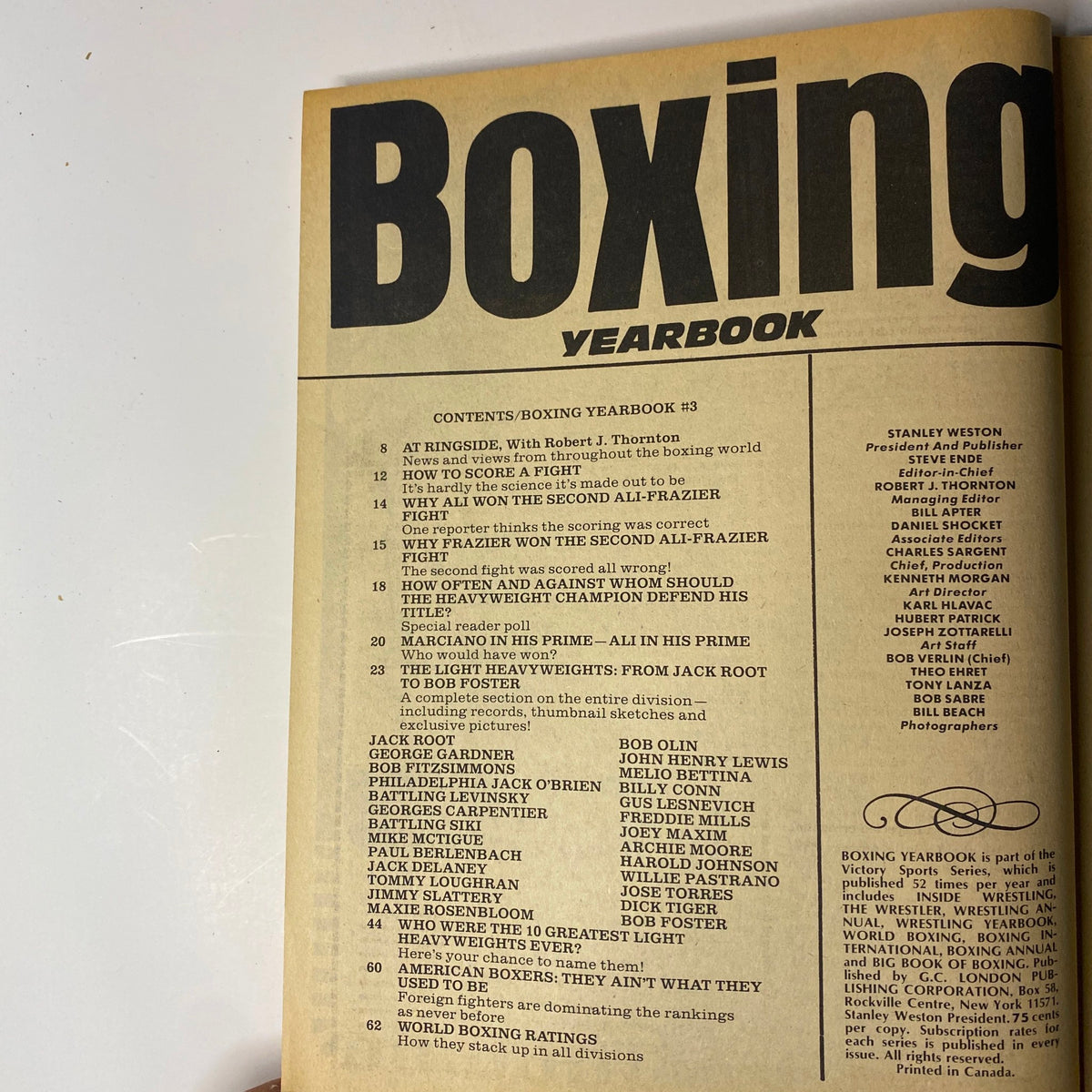 Interior page of 'Boxing 1974 Annual Yearbook Magazine' with the table of contents, detailing articles and features related to the boxing world, including notable matches and champions.