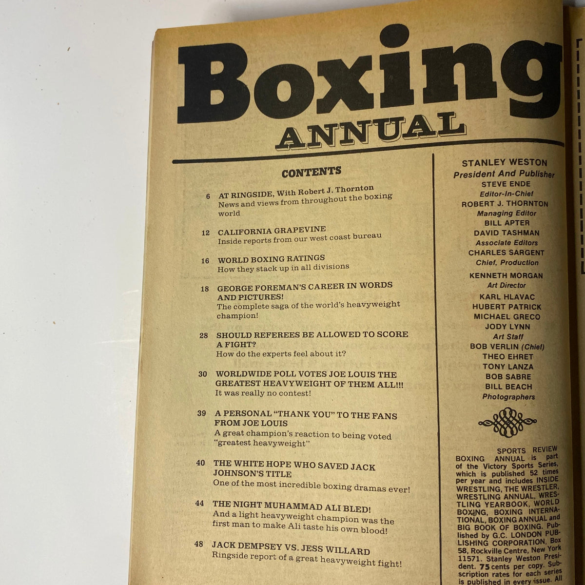 Contents page of Boxing Magazine 1974 Annual #2 outlining featured articles such as George Foreman's career, Joe Louis, and referee scoring in boxing.