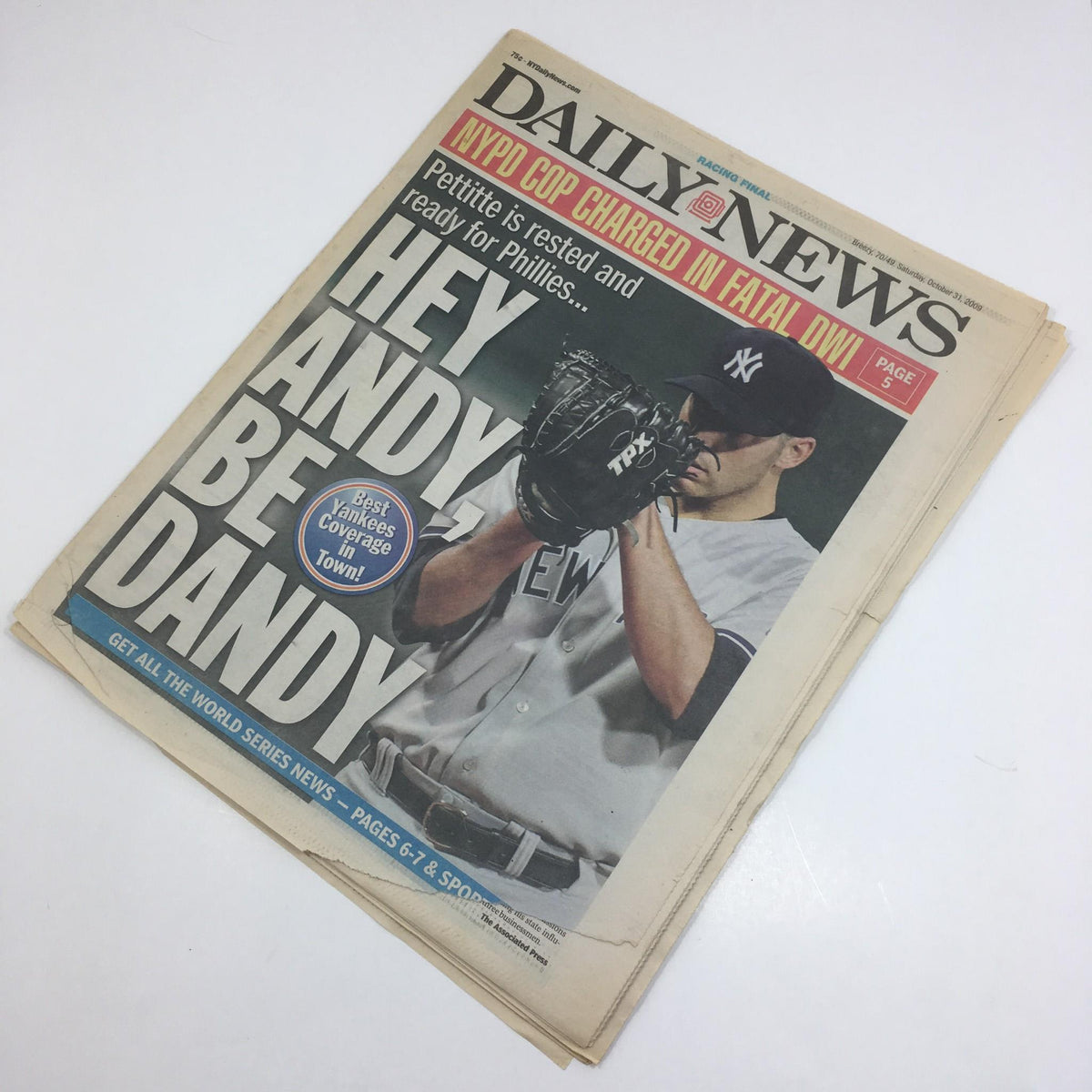 Another view of the front page of the New York Daily News from October 31, 2009, showcasing the headline 'Hey Andy, Be Dandy' with an image of a pitcher.