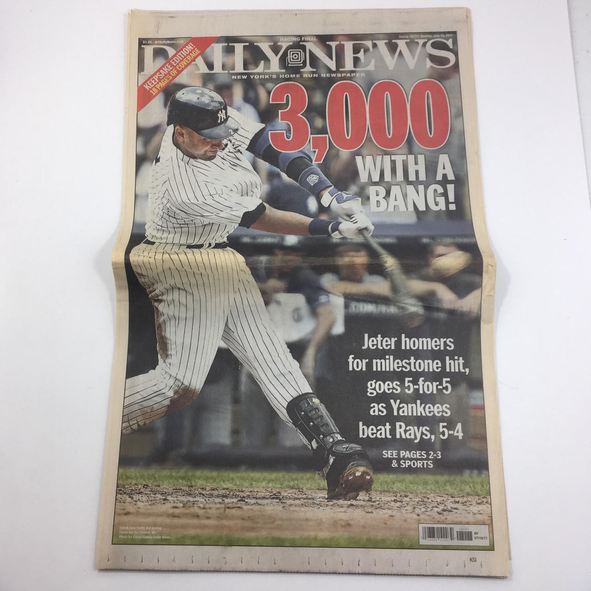 New York Daily News cover from July 10, 2011, featuring the headline '3000 with a Bang' celebrating Derek Jeter's milestone achievement, showcasing his batting action.