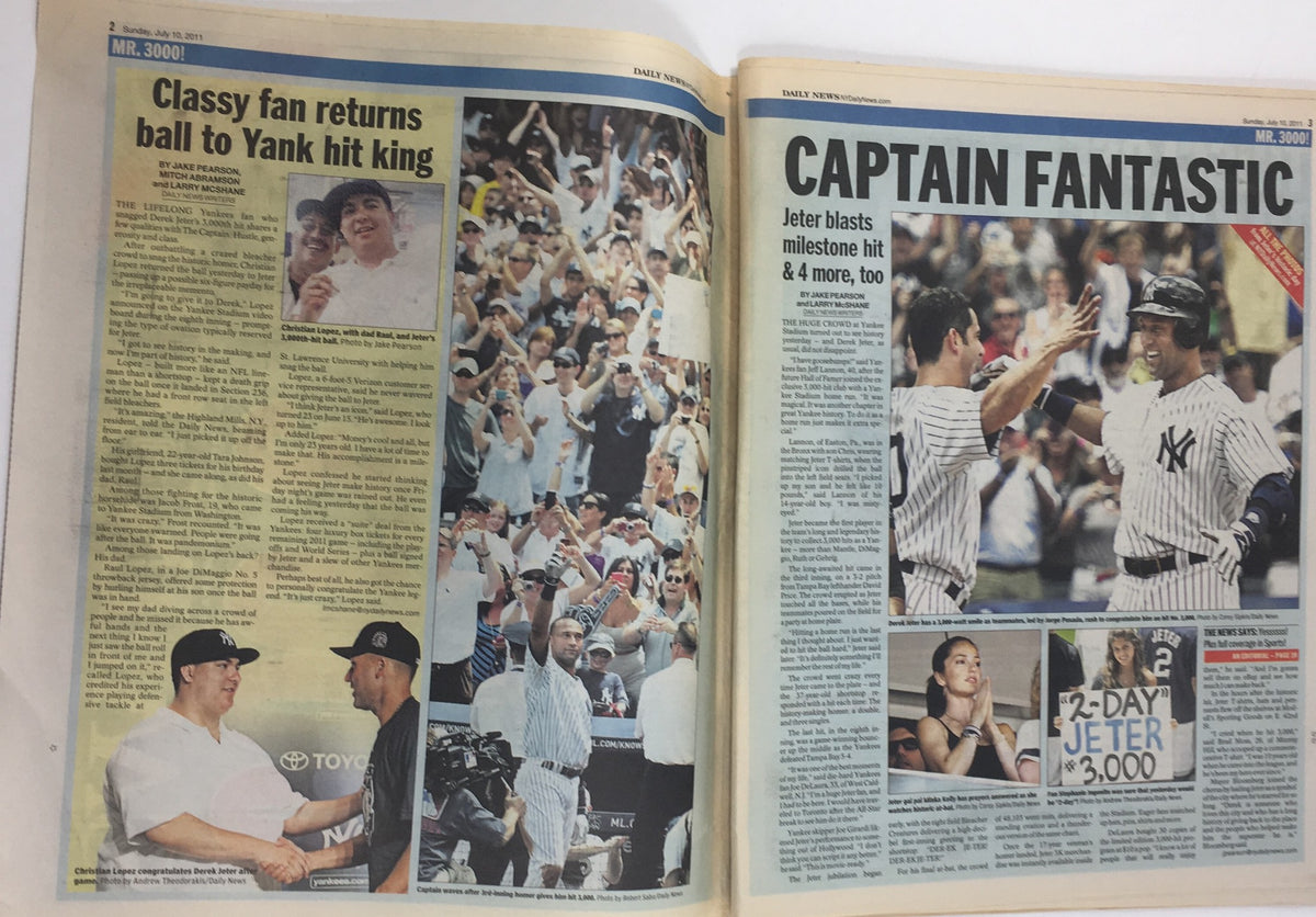 Inside pages of the New York Daily News from July 10, 2011, featuring articles about Derek Jeter's milestone hit and fan reactions, capturing the excitement of the event.