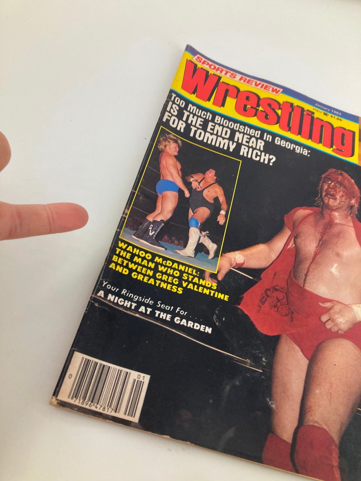 Cover of the VTG Sports Review Wrestling Magazine January 1983 featuring Tommy Rich and Greg Valentine, showcasing wrestling action and a bold title asking, 'Is the End Near for Tommy Rich?'.