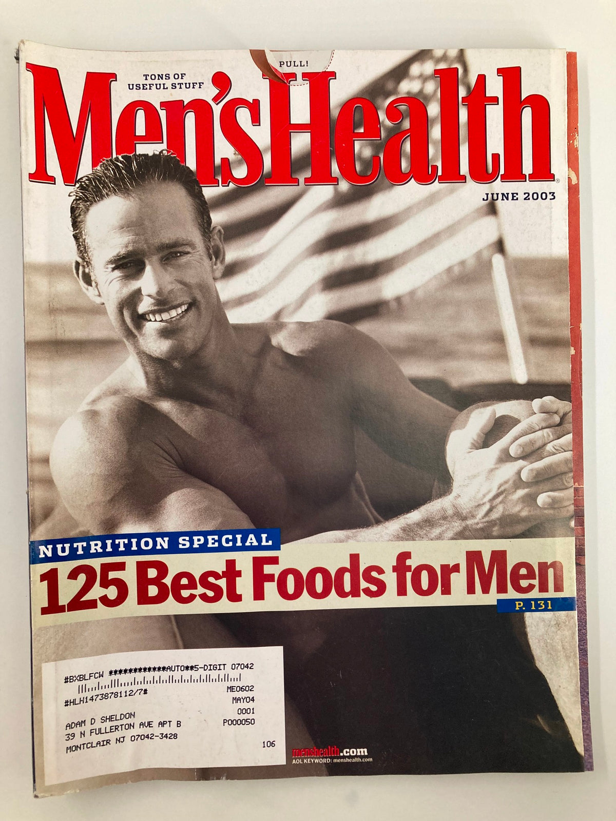 Cover of Men's Health Magazine June 2003 featuring the article 'In Defense of Deadbeat Dads' by Harry Jaffe, displaying a fit model promoting health and wellness.