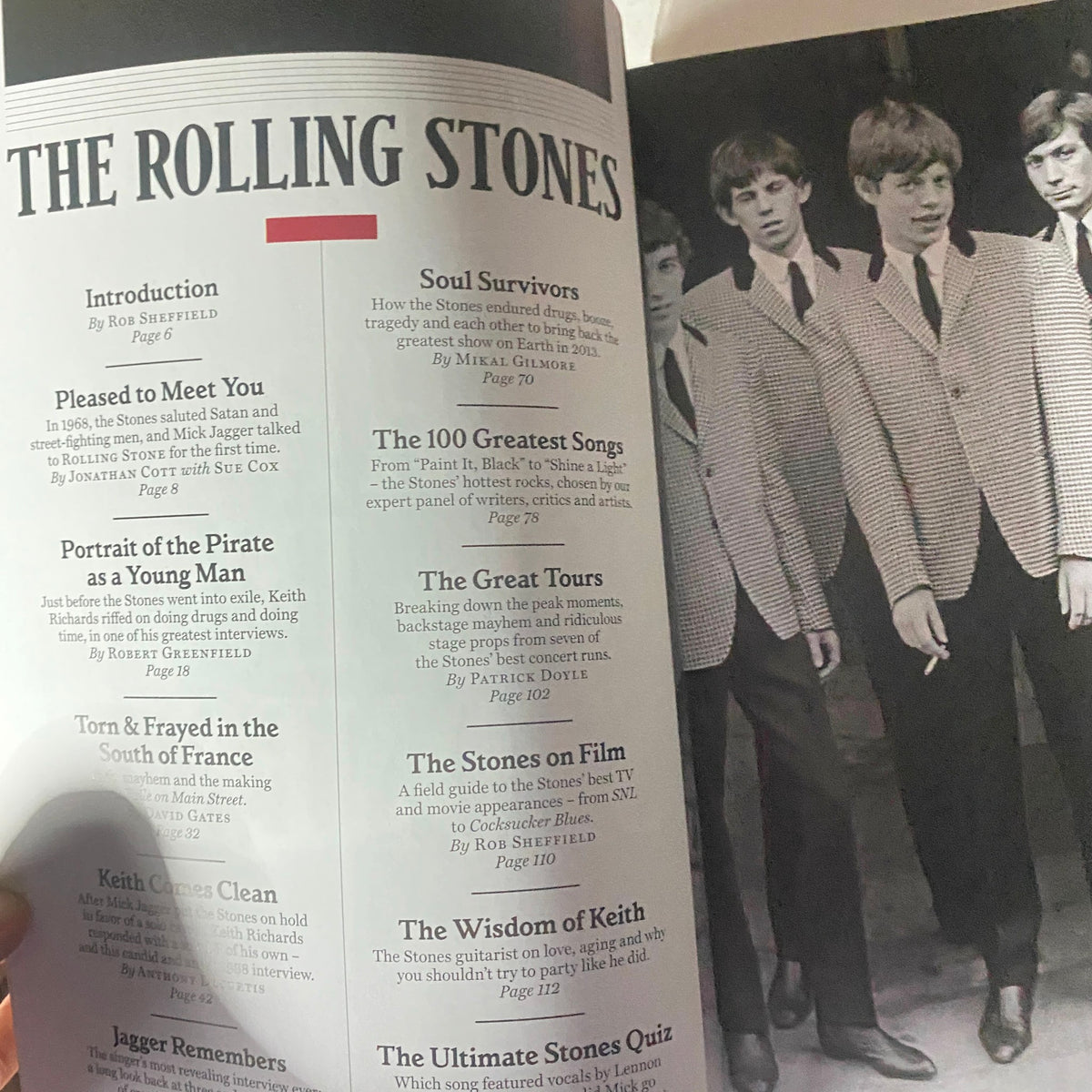 Inside view of Rolling Stone Magazine, September 2013, showcasing articles about The Rolling Stones, including details on their greatest songs and band history.