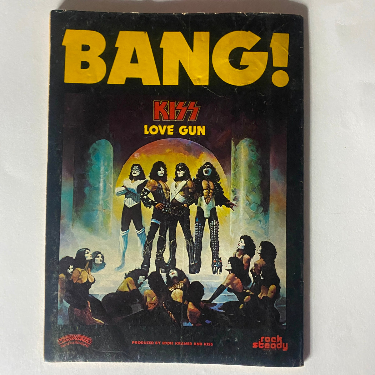 Cover image of the vintage magazine Rock Scene Magazine September 1977 featuring the title 'Bang! Kiss Love Gun' with iconic images of the band KISS, showcasing the cultural impact of rock music.